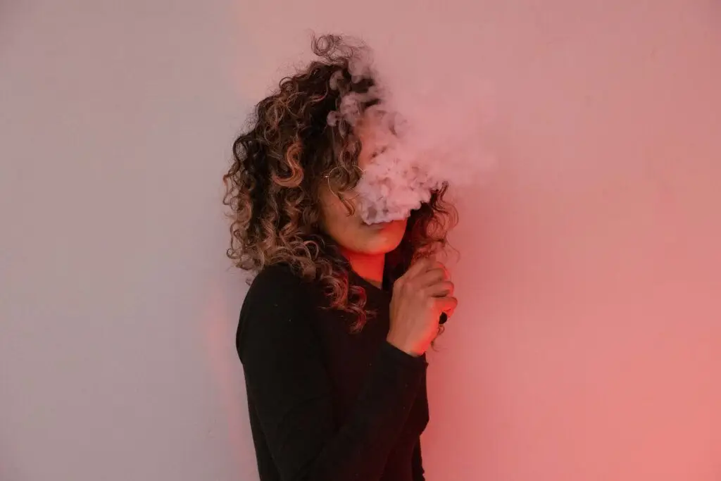 portrait-of-woman-smoking-a-vape-DABX5PY.jpg